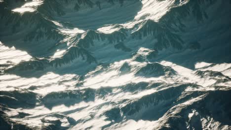 Aerial-view-of-the-Alps-mountains-in-snow